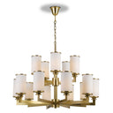 Ahern 15 light solid brass chandelier with mouth-blown opal glass shades, creating luxury lighting in a grand dining room.