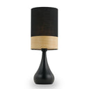 Akira Ceramic Table Lamp displayed on a modern bedside table, featuring a smooth white ceramic base with a contemporary fabric shade and copper accent band.