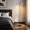 Minimalist LED floor lamp enhancing a Scandinavian-inspired interior with its clean architectural profile and premium glass detailing.