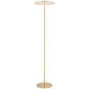 Modern designer floor lamp with a matt brass finish and amber glass shade, creating a warm and luxurious atmosphere in a sophisticated living room.