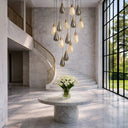 Luxury Atico 15-light chandelier showcasing suspended smoke and champagne glass pendants, premium LED lighting, and architectural design for upscale interiors.