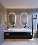 SO500C premium back-lit LED bathroom mirror with cool white lighting  in a Modern bathroom with double sink vanity, illuminated mirrors, and a black ladder.