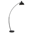 Beat Floor Lamp positioned beside a contemporary sofa, featuring a sweeping curved arm and dome-shaped metal shade for elegant overhead lighting.