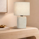 CELSUS Table Lamp Small with limestone look textured base on a modern table