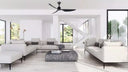 Martec Genoa DC 50″ Smart Ceiling Fan With WiFi Remote Control Matt Black . Lights and Fans Online  in a Modern living room with white furniture and large windows