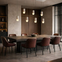Contemporary kitchen island pendant with sculptural cast stone shades, adjustable suspension, and minimalist LED ceiling lighting for open-plan homes.