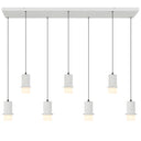 Kolisa 7 Light LED pendant bar with natural cast stone shades, creating modern linear lighting above a contemporary kitchen island.