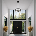 Designer drum ceiling light with clear textured glass panels, premium iron frame, and ambient lighting for modern homes and boutique hotels.