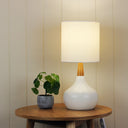 Contemporary white and timber table lamp for modern bedroom interiors