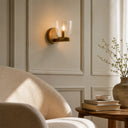 Designer vintage brass wall sconce with exposed globe design