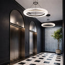Contemporary designer pendant light with integrated LED technology, TRIAC dimming, high CRI illumination and elegant circular frame.