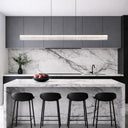 Contemporary linear pendant light for kitchen island and dining table featuring 3CCT colour selection and energy-efficient LED illumination.