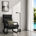 Scandinavian-inspired living room featuring the Satrom Floor Lamp with minimalist styling, integrated LED technology, and natural stone detailing.