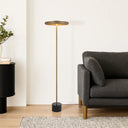 Modern floor lamp enhancing a boutique hotel suite with elegant ambient lighting, premium marble detailing, and contemporary designer aesthetics.