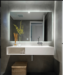 Thermogroup  SS128C premium back-lit LED bathroom mirror with cool white lighting in a Modern Australian bathroom with large LED back-lit mirror 