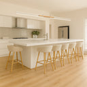 Warm 3000K LED illumination casting soft, even light across a modern dining space with Scandinavian-inspired décor.