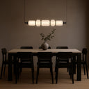Elegant Torso 5 LED Pendant Light featuring integrated LED lighting and premium textured glass shades for sophisticated home décor.