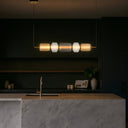 Premium Torso 5 LED Pendant Light crafted from durable iron and decorative glass, delivering stylish lighting for luxury residential and commercial interiors.