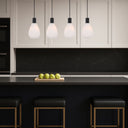 Contemporary Tresor 4 Pendant Light with elegant teardrop opal glass shades, perfect for kitchen islands, dining rooms, and luxury home lighting.