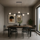 Tyson 6 Pendant Light in antique gold finish with smoke tear glass shades creating luxurious ambient lighting for modern homes.