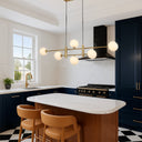 Modern linear Tyson 6 Pendant Light featuring six interchangeable glass shades for luxury home and apartment interiors.