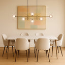 Designer Tyson 6 Pendant Light with smoke glass shades adding elegant architectural lighting to dining rooms and living spaces.