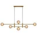 Tyson 6 Pendant Light in antique gold finish with amber tear glass shades, featuring a modern linear pendant light for luxury dining room interiors.