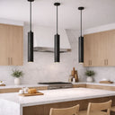 TORESS 50cm Charred Black Pendant Light Modern kitchen with black pendant lights, wooden cabinets, and white countertops.