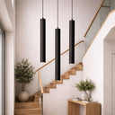 TORESS 80cm Charred Black Pendant Light in a Modern staircase with black pendant lights and decorative plants.