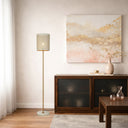 Premium iron floor lamp featuring a minimalist silhouette and perforated shade, ideal for Scandinavian and modern home décor.