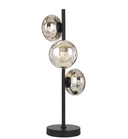 Varlin Table Lamp with mirrored speckled glass shade creating a warm ambient glow for modern bedrooms and living spaces