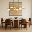 Contemporary kitchen island pendant with frosted textured glass shades, premium iron frame, and architectural ceiling lighting.