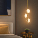 Modern 3-light vertical pendant with artisan-inspired textured glass shades and decorative lighting for entryways and hotel lobbies.