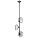 Zecca 3 vertical pendant light with burlap textured frost glass shades and black finish, creating elegant stairwell lighting for modern interiors.