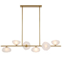 Zecca 6 linear pendant light with burlap textured frost glass shades and antique gold finish, creating elegant kitchen island lighting.