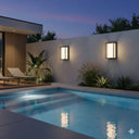 Martec Crew Tricolour LED Wall LightModern pool area with wall lights and garden at night from lights and fans online