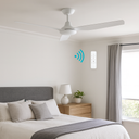 Martec Viper DC 48″ & 52″ 3 Blade Smart Ceiling Fan With WIFI Remote Control from lights and fans online in a bedroom with a control panel on the wall.